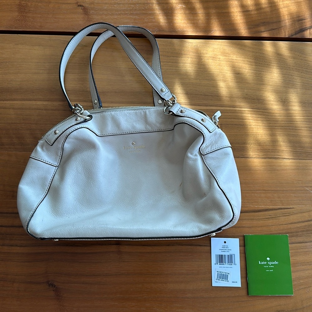 Tan Kate Spade purse with gold detail